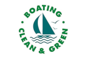 Boating Clean and Green Logo. An illustration of a blue-green sailboat, silhouettes of seagulls, and wavy lines for water.