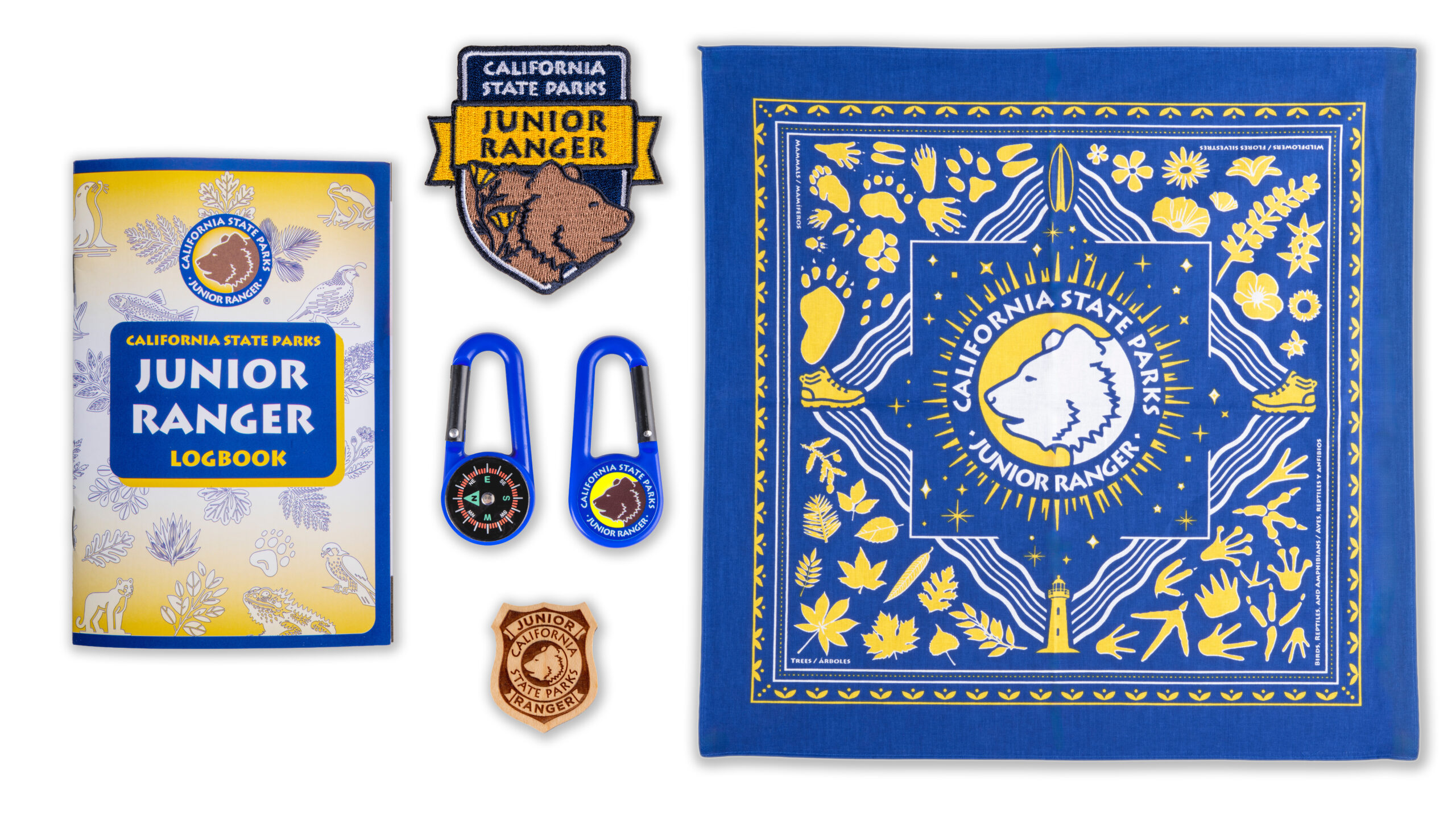 Graphic collage of photographs of California State Parks Junior Ranger program materials laid flat, including: logbook, patch, compass clip, badge, and bandana