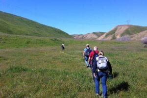 Hikers are being led along the "Path of the Padres" in San Luis Reservoir SRA