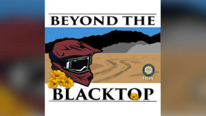 Logo for the Beyond the Blacktop Podcast. A helmet and poppies, with a desert in the background