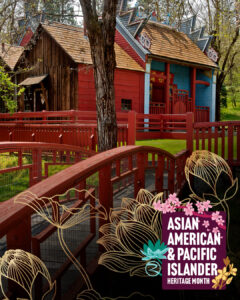 A photograph of a the Weaverville Joss house. A red wooden bridge with railings curves through the foreground, surrounded by green grass and tall trees. Decorative floral graphics overlay the bottom-right corner, framing a purple box with the text “Asian American & Pacific Islander Heritage Month.” The floral designs include gold line art flowers and pastel-colored blossoms