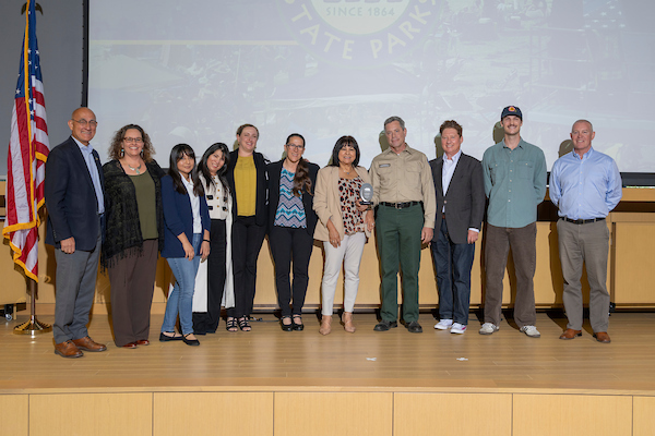 Eleven people standing on stage at California State Parks' Director's Awards 2026